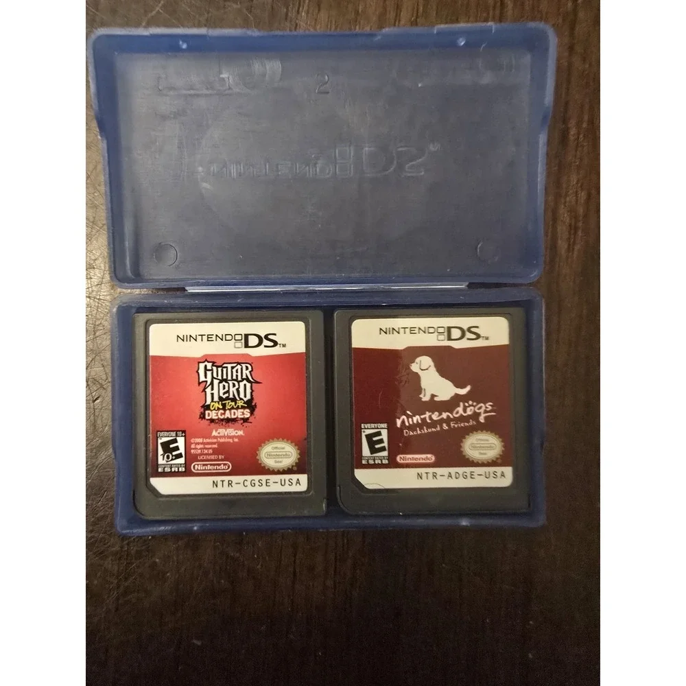 Nintendo DSi Handheld Console Bundle w/ USB Micro Charger, Case & 2 Games